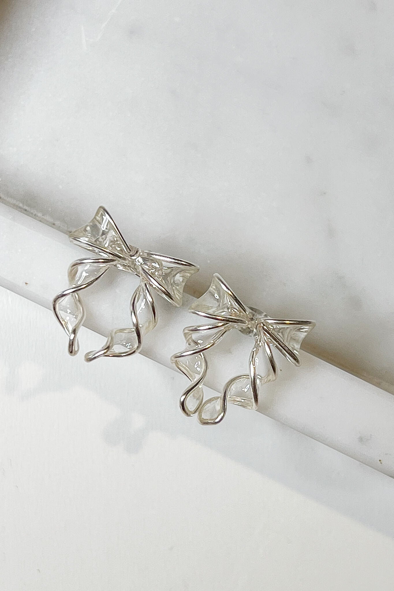handmade silver bow ribbon studs 