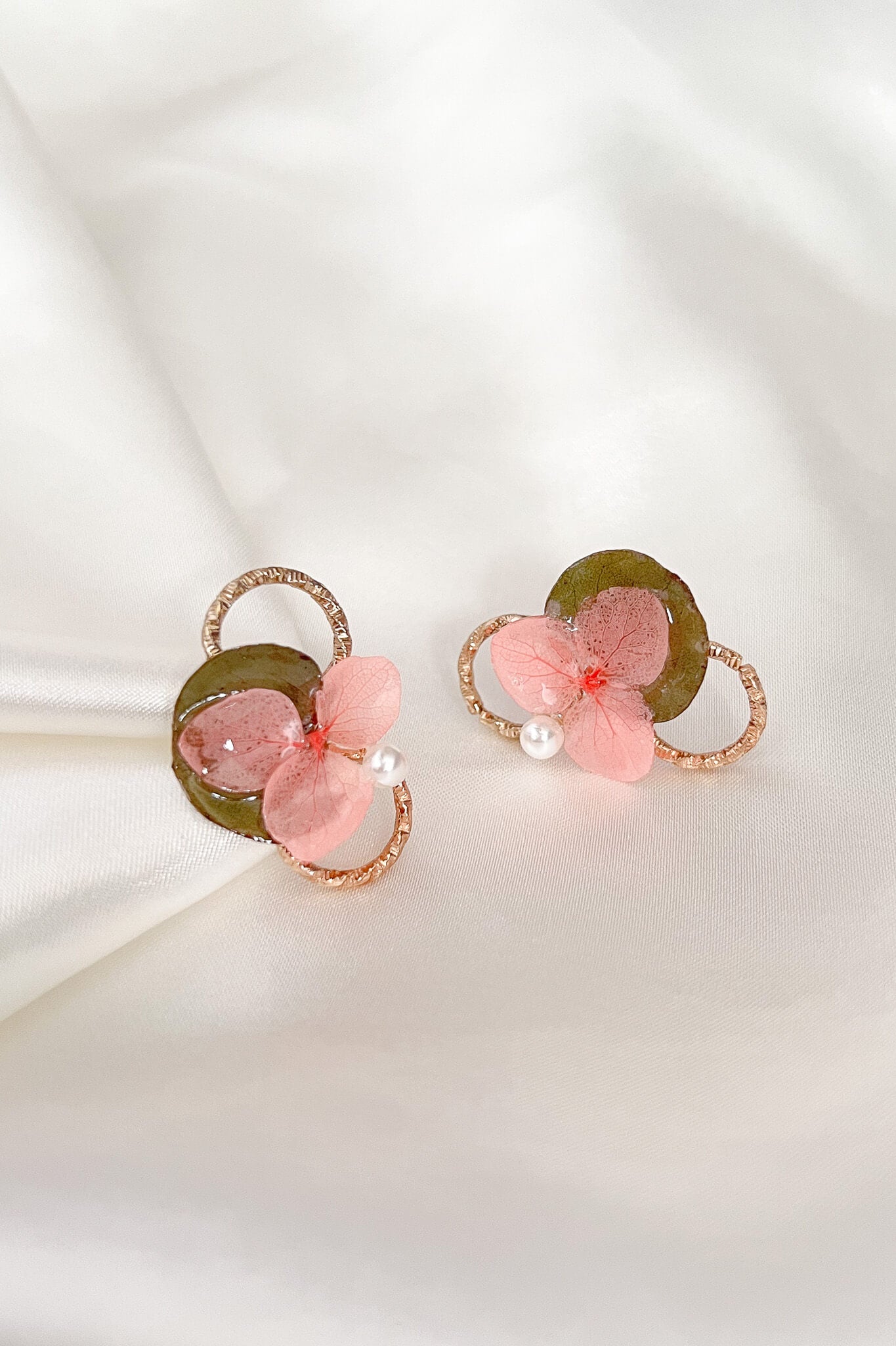 Handmade resin earrings with pearls, hydrangea, eucalyptus and gold hardware accent