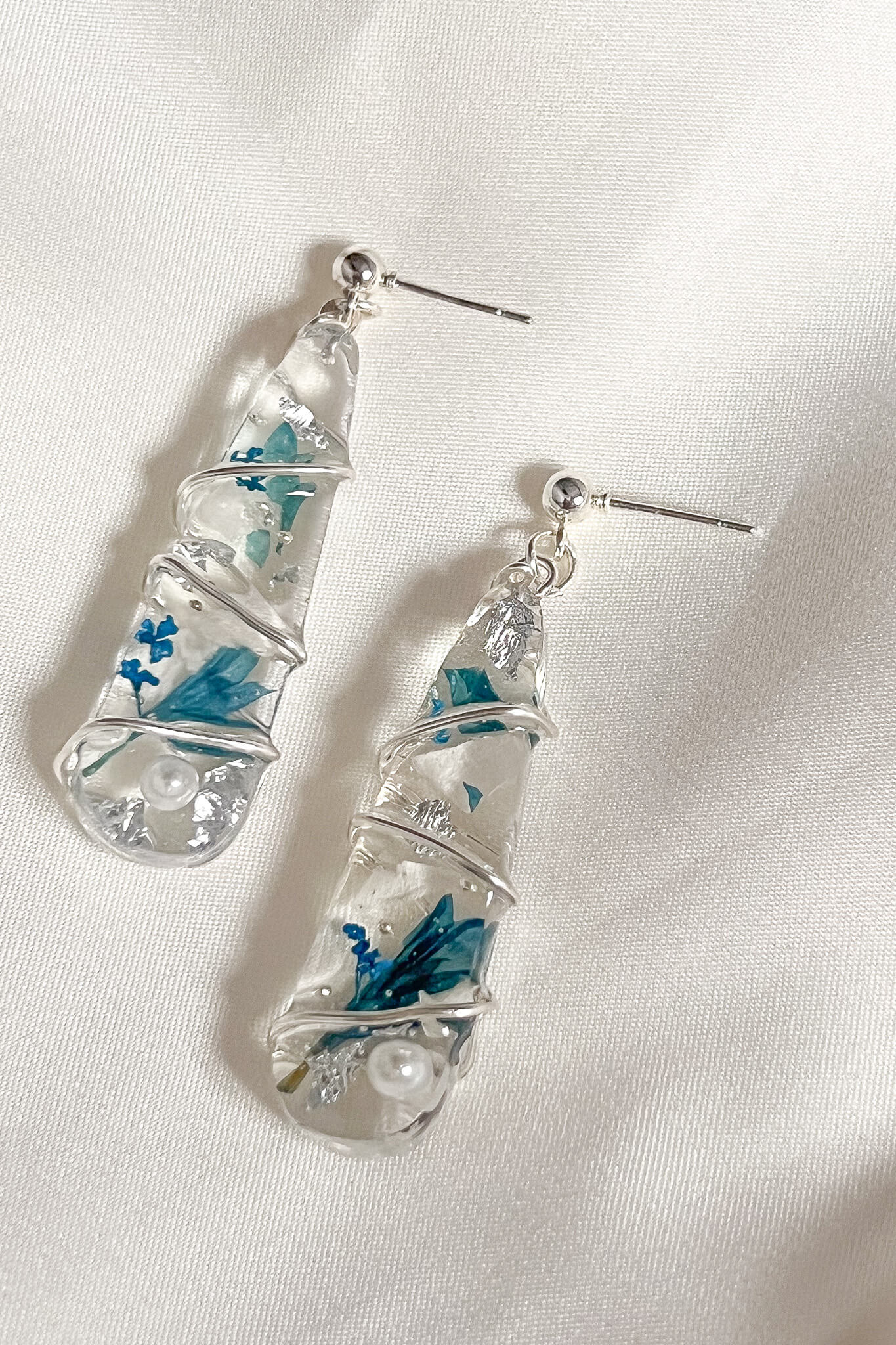 icy look silver dangle earrings - flowers and pearls in resin wrapped with silver jewelry wire
