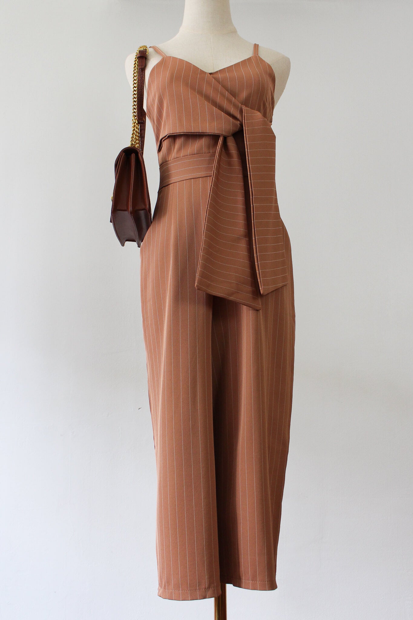 Striped jumpsuit with front twist. Perfect workwear or brunch outfit