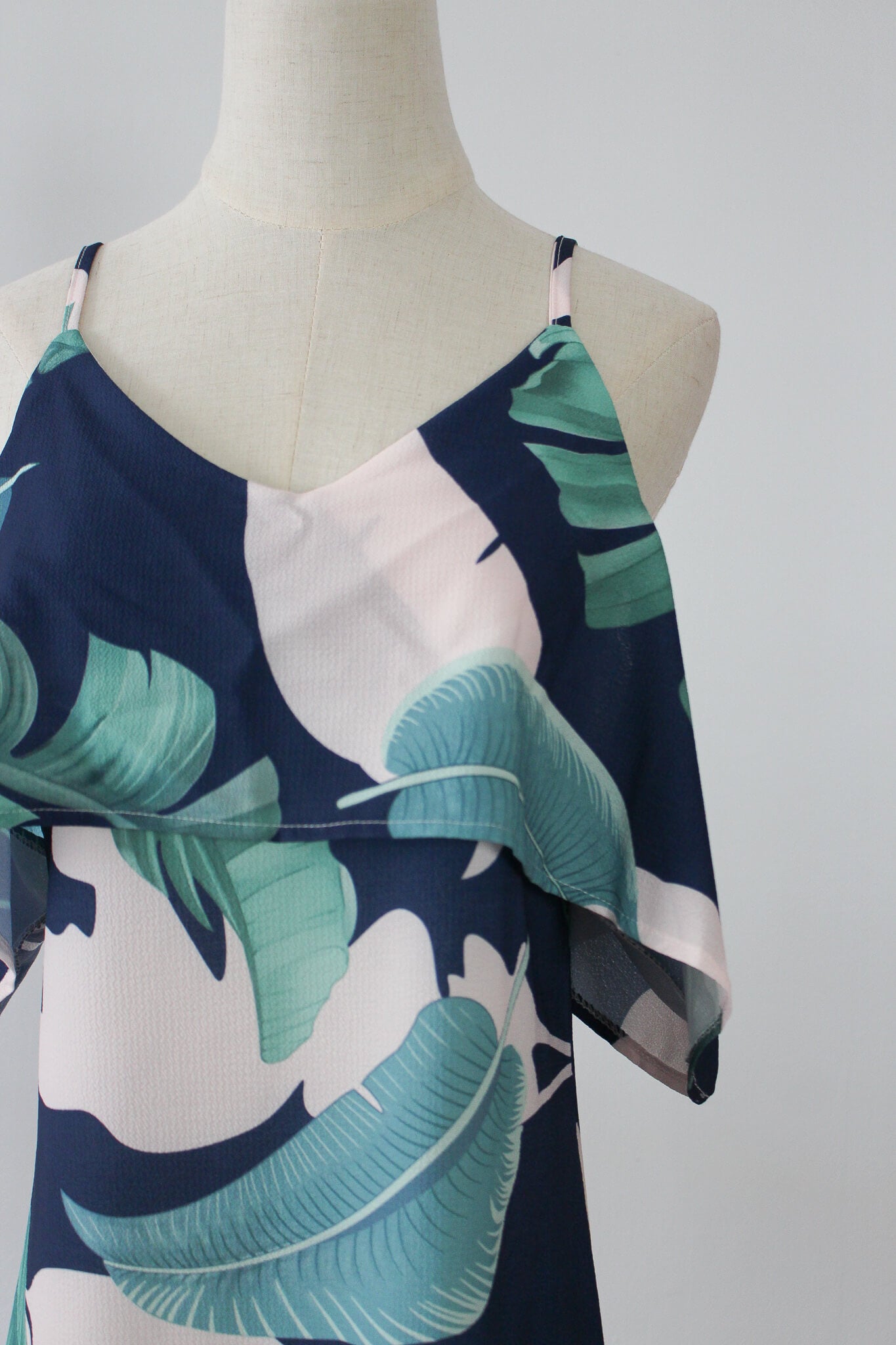 leaf printed loosely fitted cold shoulder dress. thin and lightweight material perfect for summer