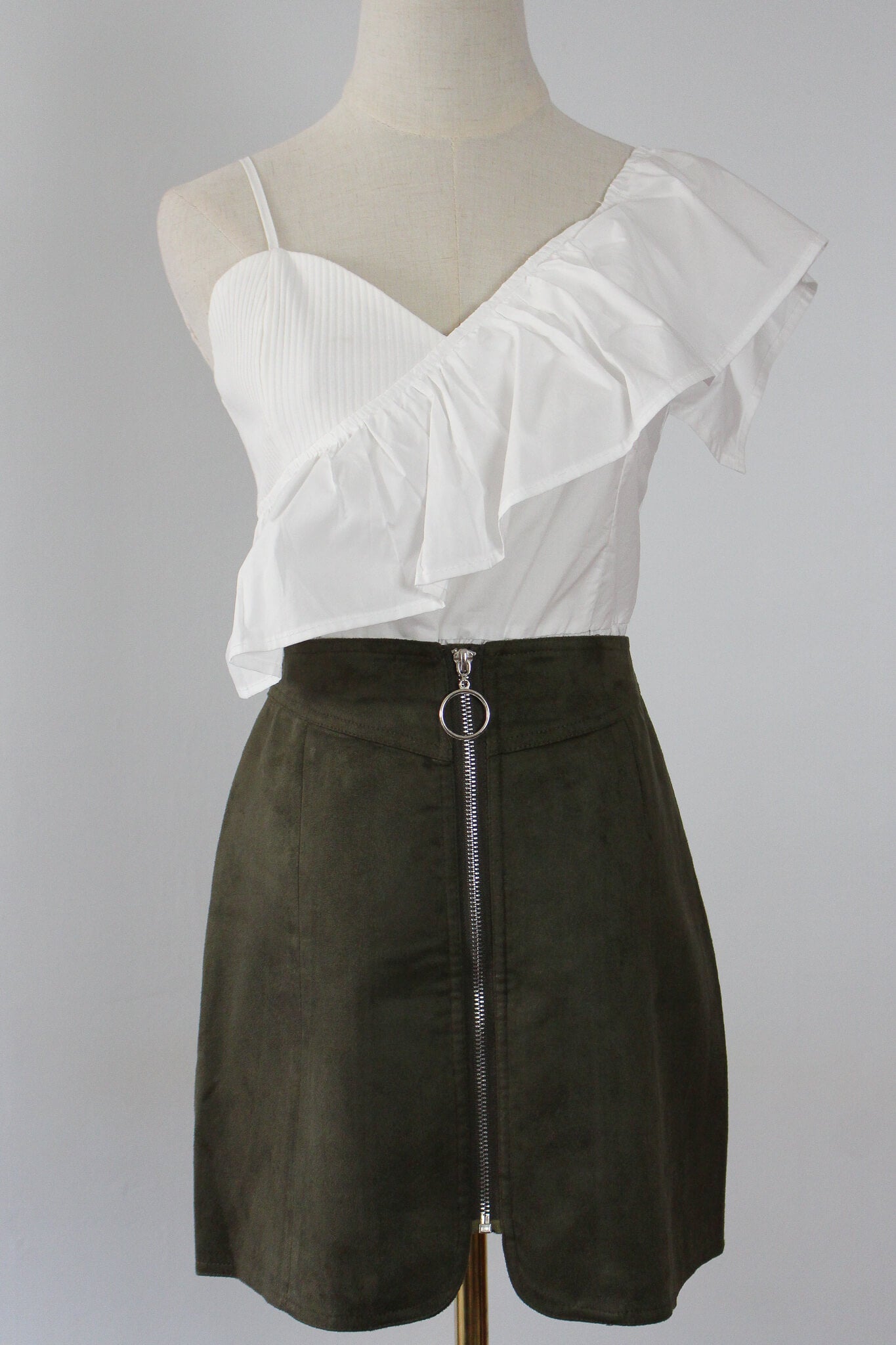Front zipper skirt with suede like material. High waist fit