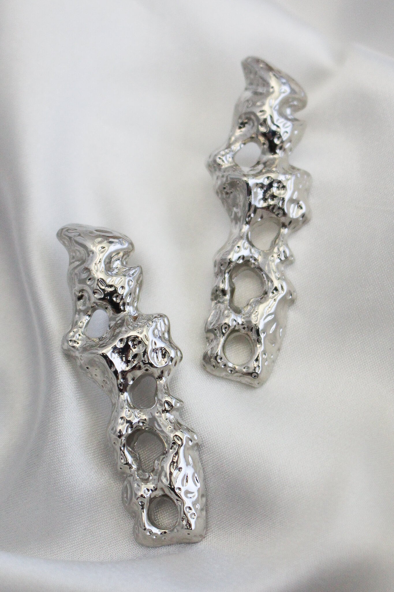 Silver odd shaped stud earrings