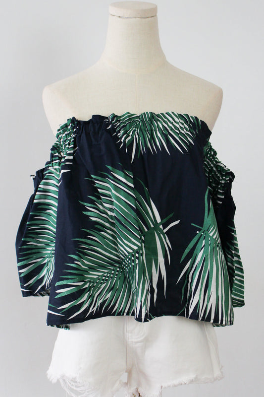 Navy blue off-shoulder top with palm leaf print, perfect for summer